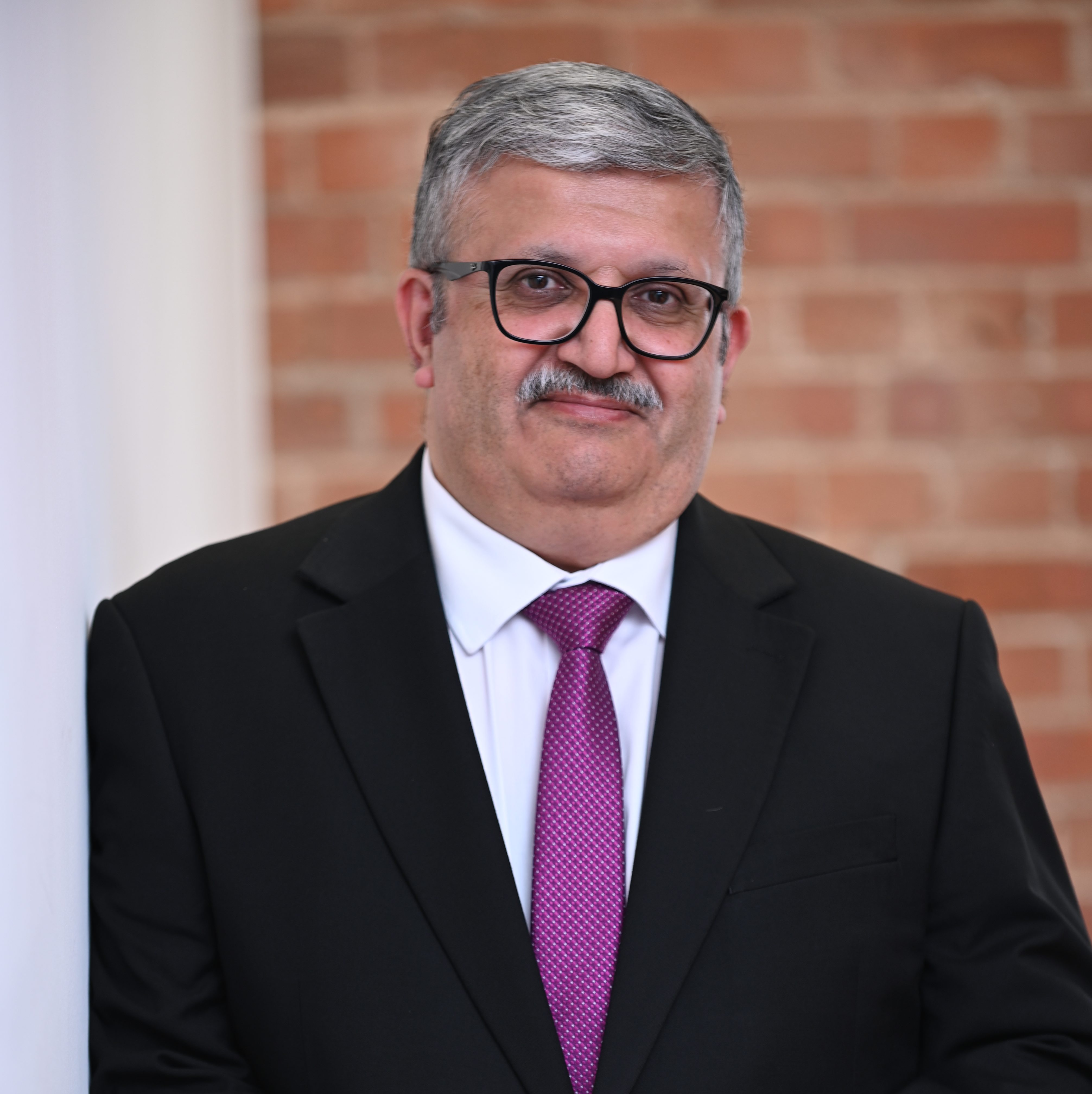 Headshot of Jabeer Butt